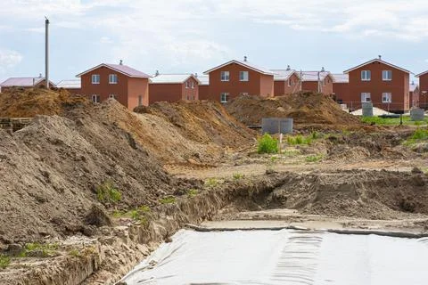 Construction of new two-storey brick houses. Urban-type settlement. Stock Photos