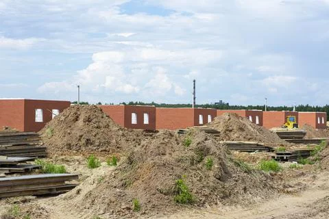 Construction of new two-storey brick houses. Urban-type settlement. Stock Photos