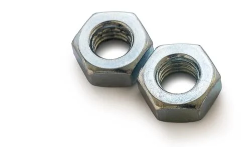 Construction nuts close-up on a white isolated 写真素材