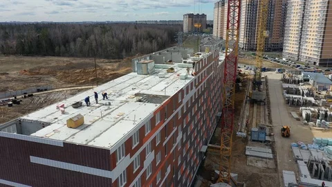 Construction of a panel apartment building on the edge of the city Stock-Footage 128119753