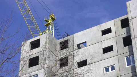 Construction of a panel house. Unfinished apartment building Stock Footage 98122292
