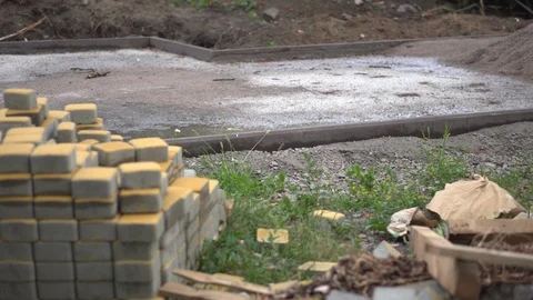 Construction of a pedestrian path in the city park on a summer day. Construction 動画素材 92347537