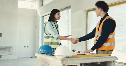 Construction, people and contractor with handshake for building partnership or Stock Footage 344934755