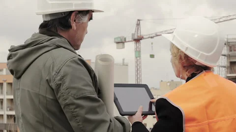 Construction people using electronic tablet on site Stock Footage 34281216