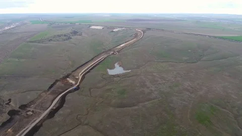 Construction of the pipeline. Site construction. Construction machinery Stock Footage 104166170