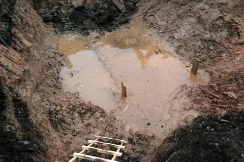 Construction pit filled with water Stock Photos
