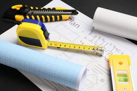 Construction planning tools with blueprint and measuring tape for architectur Stock Photos