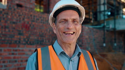 Construction, portrait or mature man on site with smile, pride and ambition as Stock Footage 336202046