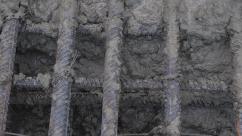 Construction, pouring metal structures with concrete Stock Footage 300866094