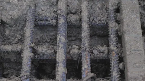Construction, pouring metal structures with concrete Stock Footage 300866097
