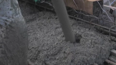 Construction, pouring metal structures with concrete Stock Footage 300871559