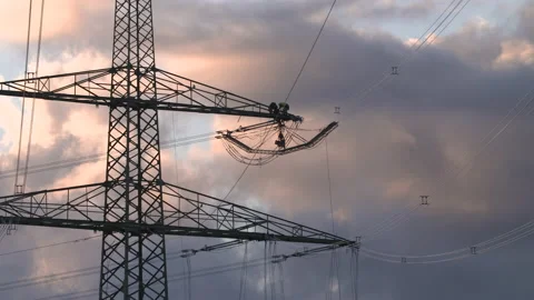 Construction of Power Lines on a Power Pole Stock Footage 163079319