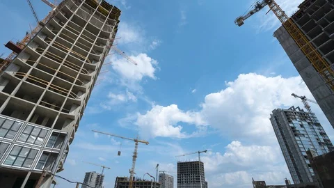 Construction, the process of building a residential complex, construction cranes Stock Footage 128501105