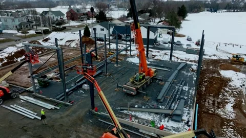 Construction Process of a New Building in Winter at a Suburban Site With Cr.. Stock Footage 340339741