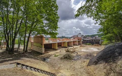 Construction process of new residential building at construction site Stock Photos