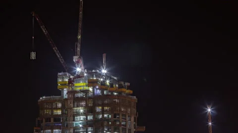 The construction process of a residential complex aerial night timelapse. Stock Footage 170130795