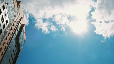 Construction process of skyscraper and new apartments on a blue sky. New house Vídeos de archivo 110416290