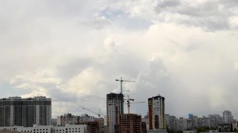 Construction process under cloudy summer sky Stock Photos