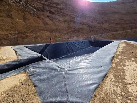 Construction process of water pools with geosynthetic materials Stock Photos