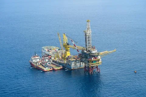 Construction of production process in the sea. Power energy of the world. Stock Photos