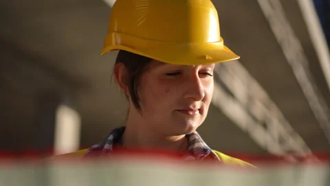 Construction Professional with Safety Gear, showcasing expertise and teamwork Stock Footage 311861866