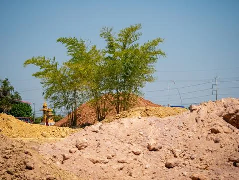 Construction progress at a building site with natural elements urban landscap Stock Photos