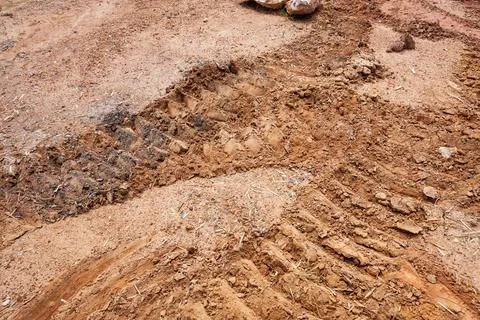 Construction progress heavy machinery tracks in soil outdoor site groundwor.. 스톡 사진