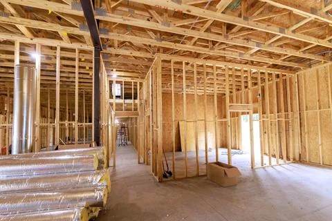 Construction progress inside new residential building in an urban area during Stock Photos
