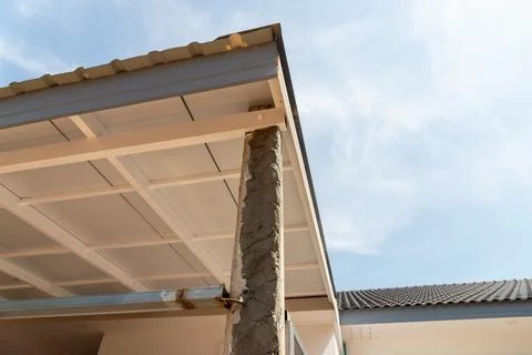 Construction progress modern building roof urban area clear sky upward angle 写真素材