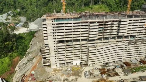 Construction Progress of Modern High-Rise Building with Scaffolding and Stock Footage 316450367