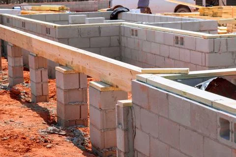 Construction progress of new building foundation with concrete blocks wooden 스톡 사진
