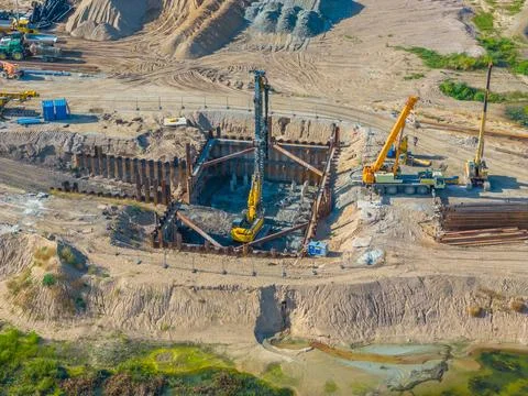 Construction progress of a new modern bridge building. Aerial drone view 스톡 사진