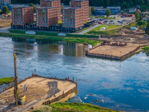 Construction progress of a new pedestrian bridge building. Aerial drone view 库存照片
