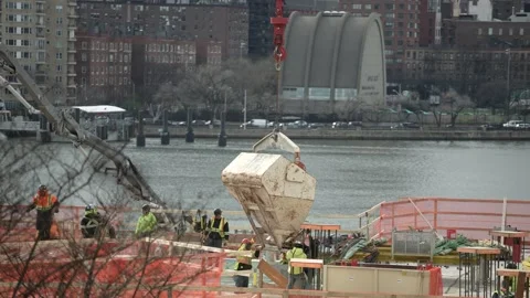 Construction progress in NYC with river view on cloudy day Stock Footage 241451351