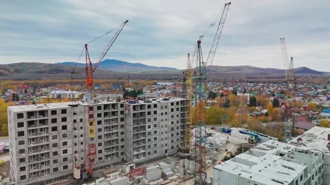 Construction progress of residential buildings in a mountainous area Stock Footage 289543195