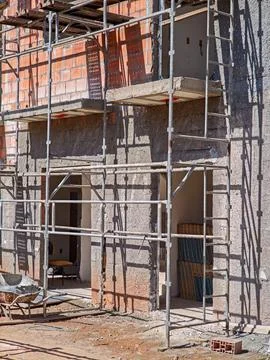 Construction in Progress with Scaffolding Stock Photos