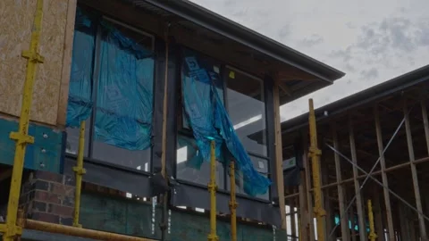 Construction Progress: Unfinished Roof Windows Framework on Residential Building Stock Footage 305107493