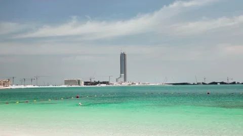 Construction progress at Wynn Casino on Al Marjan Island under clear skies 스톡 동영상 333707094