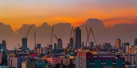 Construction project in the city sunset Stock Footage 120244903