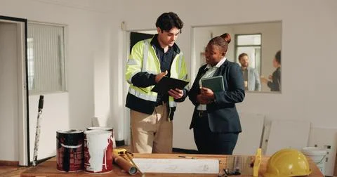 Construction, project management and tablet with architect team in home for Stock Photos