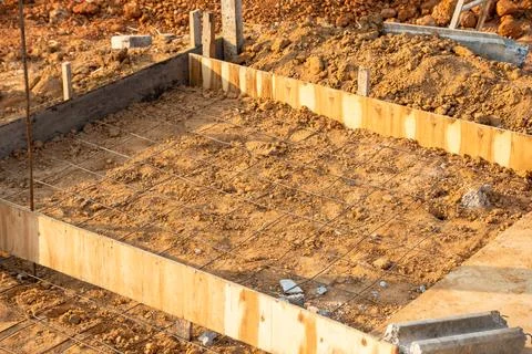 Construction project progress foundation work at building site outdoor envi.. Stock Photos