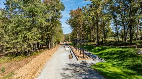 Construction Project in a Wooded Area During Daytime With Clear Skies Stock Photos