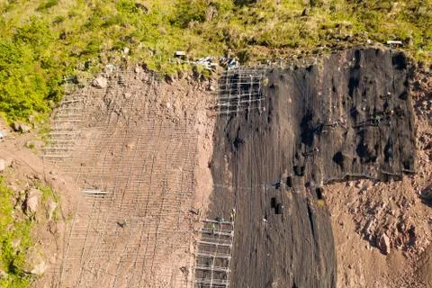 Construction of protective barriers against rock falls and landslides in the Stock Photos