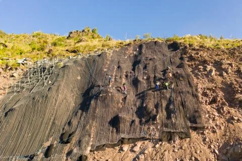 Construction of protective barriers against rock falls and landslides in the Stock Photos