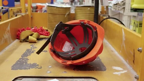 Construction protective helmet lies, orange helmet. Stock Footage 204747835