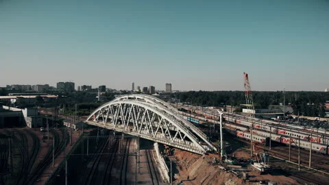 Construction of a railway bridge in the metropolis. Train rides, top view Stock Footage 142131958