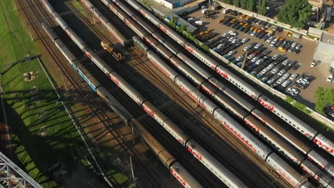 Construction of a railway bridge in the metropolis. Train rides, top view Stock Footage 142132594