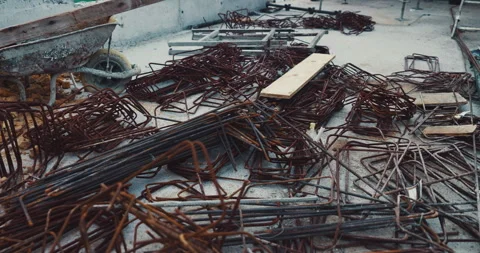 Construction, rebar and metal at empty site for building development, Stock Footage 336779547