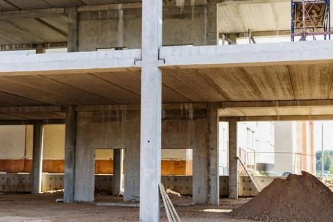 Construction of a reinforced concrete building. Elements of a concrete house. Photos