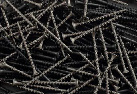 Construction, repair, tools - Self-tapping screw background Stock Photos